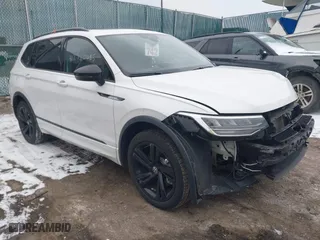 2023 Volkswagen Tiguan SE R-Line Black with VIN 3VVCB7AX6PM132085, listed as a IAAI auction lot 41278065 with 24,333 mi miles. Bid and sale history available at carsss.com. Image 1.