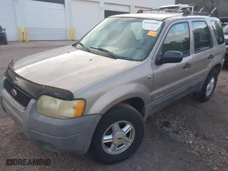 2001 Ford Escape XLS with VIN 1FMYU01141KA46852, listed as a IAAI auction lot 41616606 with 225,752 mi miles. Bid and sale history available at carsss.com. Image 2.