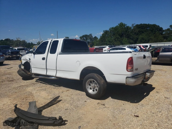 1999 Ford F-150 Work Series with VIN 1FTRX17W4XNA44647, listed as a Copart auction lot 72406314 with 300,152 mi miles and Salvage Title. Bid and sale history available at carsss.com. Image 2.