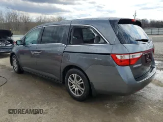 2013 Honda Odyssey EX z VIN 5FNRL5H40DB033400, wystawiony jako Copart lot #50552155 z przebiegiem 223 770 mil mil oraz Nie do naprawy. Historia ofert i sprzedaży dostępna na DreamBid. Obrazek 2.