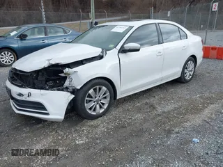 2016 Volkswagen Jetta Sedan 1.4T SE with VIN 3VWD67AJ3GM392427, listed as a IAAI auction lot 41704763 with 84,152 mi miles. Bid and sale history available at carsss.com. Image 2.