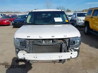 2018 Ford Flex SEL z VIN 2FMGK5C85JBA12888, wystawiony jako IAAI lot #41865380 z przebiegiem 160 425 mil mil oraz . Historia ofert i sprzedaży dostępna na DreamBid. Obrazek 13.