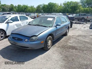 1999 Ford Taurus SE with VIN 1FAFP58SXXA242975, listed as a IAAI auction lot 42253538 with 228,824 mi miles and . Bid and sale history available at DreamBid. Image 2.