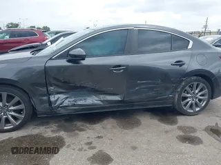 2021 Mazda 3 Preferred with VIN 3MZBPACL6MM252531, listed as a IAAI auction lot 42145811 with 35,869 mi miles and . Bid and sale history available at DreamBid. Image 6.