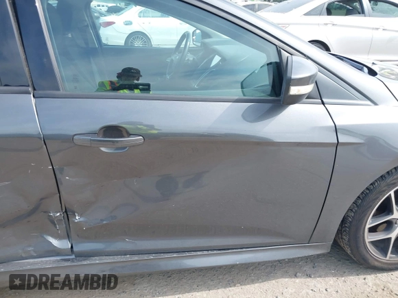 2015 Ford Focus SE with VIN 1FADP3F20FL269846, listed as a IAAI auction lot 42507197 with 143,496 mi miles and . Bid and sale history available at DreamBid. Image 13.