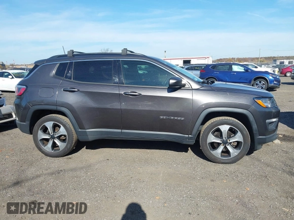 2017 Jeep Compass Latitude z VIN 3C4NJDBB9HT667415, wystawiony jako IAAI lot #40755033 z przebiegiem 106 943 mil mil oraz . Historia ofert i sprzedaży dostępna na DreamBid. Obrazek 13.