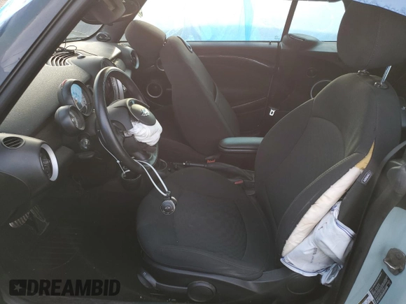 2014 MINI Convertible S с VIN WMWZP3C59ET707581, выставлен на аукционе Copart как лот 46983865 с пробегом 42 746 миль миль и Списание • Salvage title. История ставок и продаж доступна на DreamBid. Изображение 7.
