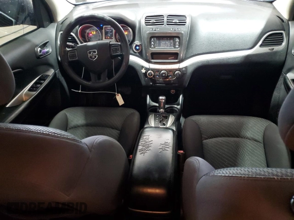 2013 Dodge Journey American Value with VIN 3C4PDCAB4DT581984, listed as a Copart auction lot 59953515 with 166,927 mi miles and Salvage title. Bid and sale history available at DreamBid. Image 8.