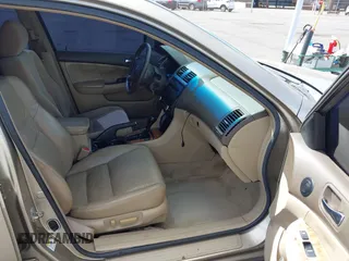 2003 Honda Accord EX z VIN 1HGCM66503A052221, wystawiony jako IAAI lot #41699132 z przebiegiem 132 623 mil mil oraz . Historia ofert i sprzedaży dostępna na DreamBid. Obrazek 5.