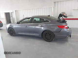 2013 Hyundai Azera with VIN KMHFH4JG3DA213459, listed as a IAAI auction lot 42642239 with 130,195 mi miles and . Bid and sale history available at DreamBid. Image 14.