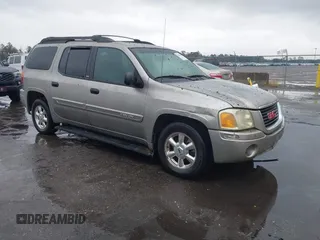 2003 GMC Envoy XL SLE with VIN 1GKES16S636145628, listed as a IAAI auction lot 41659882 with 319,510 mi miles. Bid and sale history available at carsss.com. Image 1.