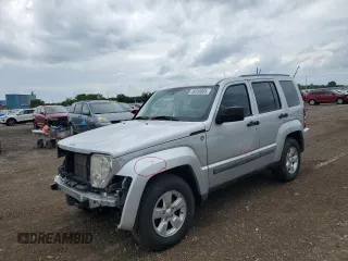 2011 Jeep Liberty Sport with VIN 1J4PN2GK4BW560388, listed as a Copart auction lot 58059865 with 143,679 mi miles and Salvage title. Bid and sale history available at DreamBid. Image 1.