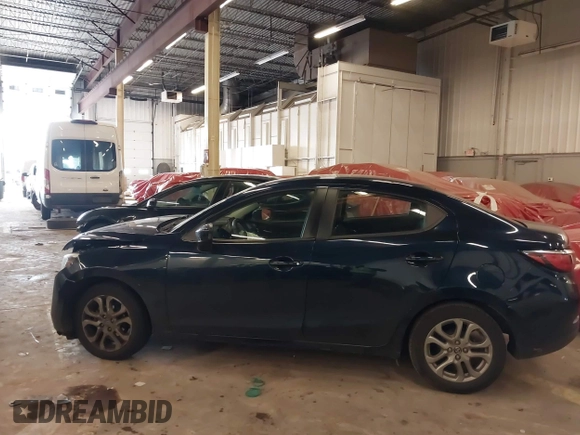 2016 Scion iA z VIN 3MYDLBZV5GY103533, wystawiony jako IAAI lot #41756270 z przebiegiem 59 290 mil mil oraz . Historia ofert i sprzedaży dostępna na DreamBid. Obrazek 14.