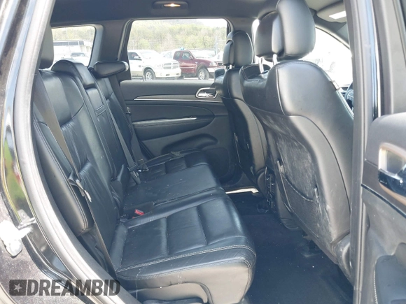2015 Jeep Grand Cherokee Limited with VIN 1C4RJFBG4FC191141, listed as a IAAI auction lot 42075659 with 135,641 mi miles. Bid and sale history available at carsss.com. Image 8.
