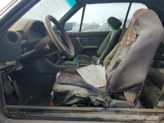 1987 BMW 3 Series z VIN WBABB2303H1942637, wystawiony jako Copart lot #59732834 z przebiegiem 167 593 mil mil oraz Szkoda całkowita • Salvage title. Historia ofert i sprzedaży dostępna na DreamBid. Obrazek 7.