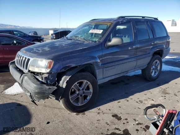 2004 Jeep Grand Cherokee Laredo with VIN 1J4GW48S44C325808, listed as a Copart auction lot 89351575 with 312,011 mi miles and Salvage Title. Bid and sale history available at carsss.com. Image 1.