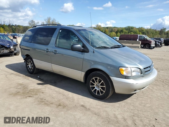 2000 Toyota Sienna LE with VIN 4T3ZF13C2YU286474, listed as a Copart auction lot 74230384 with 118,988 mi miles and Salvage Title. Bid and sale history available at carsss.com. Image 4.