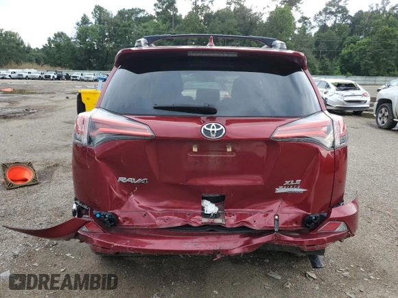 2018 Toyota RAV4 XLE with VIN 2T3WFREV7JW464160, listed as a Copart auction lot 63872925 with 70,826 mi miles and Salvage title. Bid and sale history available at DreamBid. Image 6.