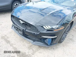 2022 Ford Mustang EcoBoost z VIN 1FATP8UH7N5124631, wystawiony jako IAAI lot #42322481 z przebiegiem 57 502 mil mil oraz . Historia ofert i sprzedaży dostępna na DreamBid. Obrazek 17.