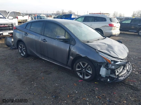 2021 Toyota Prius L Eco with VIN JTDKAMFU1M3149965, listed as a IAAI auction lot 38641916 with 69,942 mi miles. Bid and sale history available at carsss.com. Image 1.