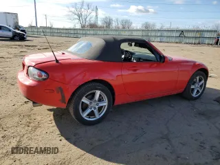2006 Mazda MX-5 Miata Touring z VIN JM1NC25F360110572, wystawiony jako Copart lot #50555765 z przebiegiem 166 785 mil mil oraz Czysty tytuł • Clean title. Historia ofert i sprzedaży dostępna na DreamBid. Obrazek 3.
