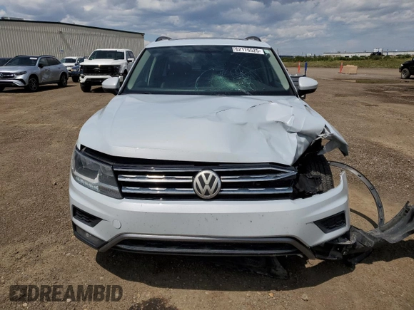 2018 Volkswagen Tiguan SEL с VIN 3VV2B7AX2JM149176, выставлен на аукционе Copart как лот 62176525 с пробегом 139 556 миль миль и Списание • Salvage title. История ставок и продаж доступна на DreamBid. Изображение 5.