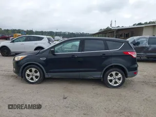 2016 Ford Escape SE with VIN 1FMCU9G99GUC13053, listed as a IAAI auction lot 41888535 with 84,019 mi miles. Bid and sale history available at carsss.com. Image 14.