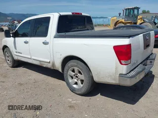 2007 Nissan Titan LE with VIN 1N6AA07B27N214751, listed as a IAAI auction lot 42325152 with 174,765 mi miles and . Bid and sale history available at DreamBid. Image 3.