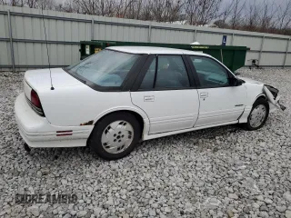 1994 Oldsmobile Cutlass z VIN 1G3WH55M2RD390391, wystawiony jako Copart lot #86277034 z przebiegiem 217 324 mil mil oraz Szkody całkowita. Historia ofert i sprzedaży dostępna na DreamBid. Obrazek 3.