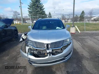 2016 Lincoln MKX Reserve with VIN 2LMTJ8LRXGBL76149, listed as a IAAI auction lot 41917774 with 90,736 mi miles and . Bid and sale history available at DreamBid. Image 12.
