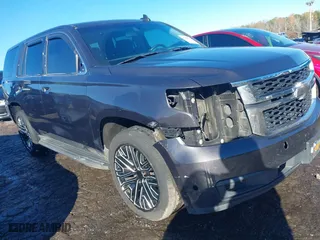 2017 Chevrolet Tahoe Commercial with VIN 1GNLCDEC1HR316004, listed as a IAAI auction lot 40868605 with 234,956 mi miles. Bid and sale history available at carsss.com. Image 1.