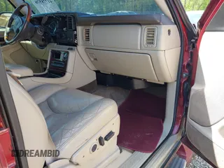 2003 Cadillac Escalade z VIN 1GYEC63T63R132602, wystawiony jako IAAI lot #41778576 z przebiegiem 242 443 mil mil oraz . Historia ofert i sprzedaży dostępna na DreamBid. Obrazek 5.