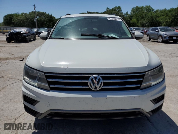 2018 Volkswagen Tiguan S with VIN 3VV0B7AX7JM065958, listed as a Copart auction lot 57598015 with 97,360 mi miles and Salvage title. Bid and sale history available at DreamBid. Image 5.