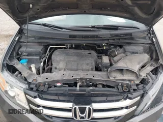 2014 Honda Odyssey EX-L with VIN 5FNRL5H62EB006346, listed as a IAAI auction lot 42061591 with 179,994 mi miles and . Bid and sale history available at DreamBid. Image 10.