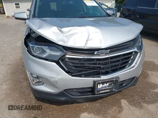 2019 Chevrolet Equinox LT z VIN 3GNAXKEV9KS504114, wystawiony jako IAAI lot #42353280 z przebiegiem 67 573 mil mil oraz . Historia ofert i sprzedaży dostępna na DreamBid. Obrazek 6.
