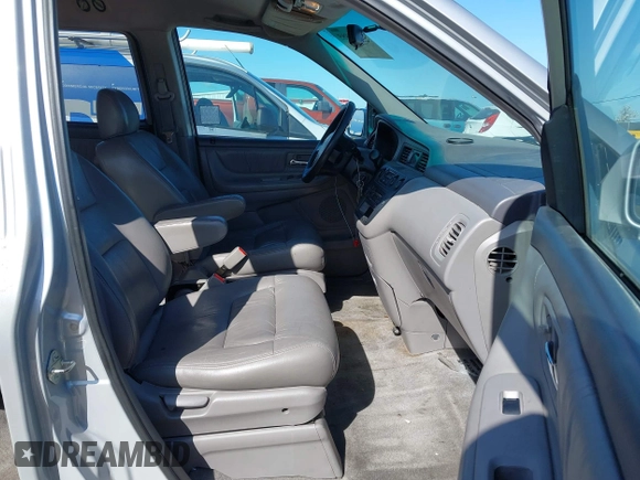 2003 Honda Odyssey EX-L with VIN 5FNRL18903B075004, listed as a IAAI auction lot 41954985 with 225,907 mi miles and . Bid and sale history available at DreamBid. Image 5.