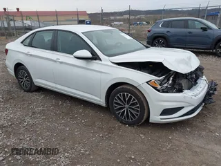 2021 Volkswagen Jetta S z VIN 3VWC57BUXMM021154, wystawiony jako IAAI lot #41898927 z przebiegiem 83 420 mil mil oraz . Historia ofert i sprzedaży dostępna na DreamBid. Obrazek 1.