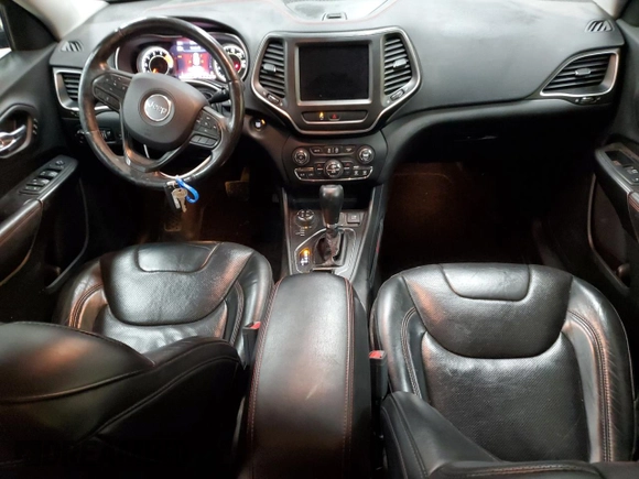 2019 Jeep Cherokee Trailhawk Elite with VIN 1C4PJMBX2KD227246, listed as a Copart auction lot 87815615 with 88,636 mi miles and Salvage Title. Bid and sale history available at carsss.com. Image 8.