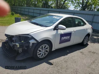 2019 Toyota Corolla L with VIN 5YFBURHE9KP894154, listed as a Copart auction lot 59214685 with 201,742 mi miles and Salvage title. Bid and sale history available at DreamBid. Image 1.
