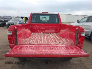 2005 Ford Ranger XL with VIN 1FTYR15E95PA58593, listed as a IAAI auction lot 41706058 with 129,282 mi miles. Bid and sale history available at carsss.com. Image 8.