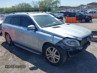 2014 Mercedes-Benz GL 450 z VIN 4JGDF7CE4EA347876, wystawiony jako IAAI lot #42386949 z przebiegiem 133 400 mil mil oraz . Historia ofert i sprzedaży dostępna na DreamBid. Obrazek 1.