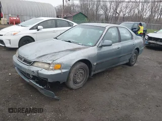 1996 Honda Accord LX with VIN 1HGCD5631TA169122, listed as a IAAI auction lot 42022239 with 164,191 mi miles and . Bid and sale history available at carsss.com. Image 2.