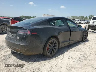 2023 Tesla Model S Plaid with VIN 5YJSA1E62PF511875, listed as a Copart auction lot 65583824 with Not provided miles and Salvage title. Bid and sale history available at DreamBid. Image 3.
