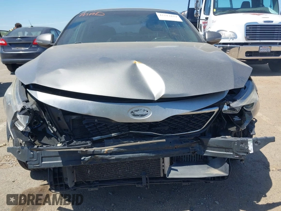 2013 Kia Optima SX with VIN 5XXGR4A61DG178390, listed as a IAAI auction lot 42212824 with 128,055 mi miles and . Bid and sale history available at DreamBid. Image 6.