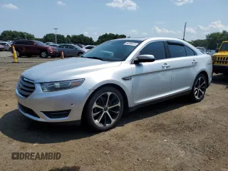 2015 Ford Taurus SEL z VIN 1FAHP2H80FG169106, wystawiony jako Copart lot #66280615 z przebiegiem 167 290 mil mil oraz Czysty tytuł • Clean title. Historia ofert i sprzedaży dostępna na DreamBid. Obrazek 1.