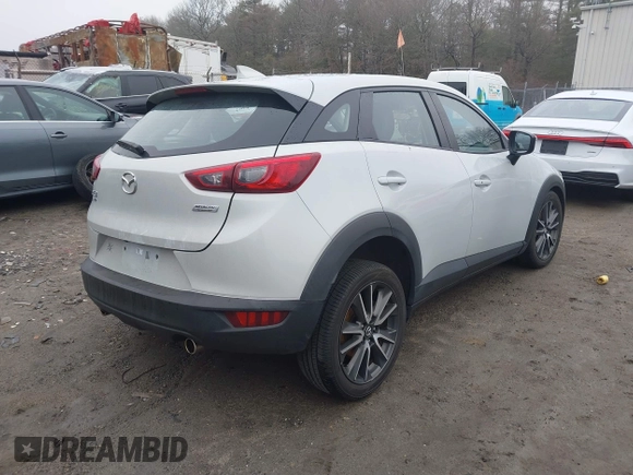 2017 Mazda CX-3 Touring with VIN JM1DKFC77H0155101, listed as a IAAI auction lot 41722040 with 92,653 mi miles. Bid and sale history available at carsss.com. Image 4.