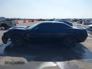 2021 Dodge Challenger R/T Scat Pack z VIN 2C3CDZFJXMH509833, wystawiony jako IAAI lot #41516858 z przebiegiem 66 880 mil mil oraz . Historia ofert i sprzedaży dostępna na DreamBid. Obrazek 14.