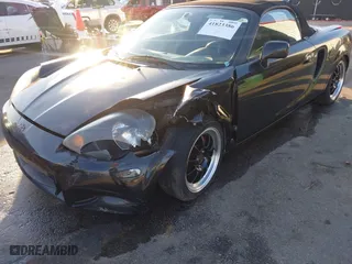 2000 Toyota MR2 Spyder with VIN JTDFR3204Y0020262, listed as a IAAI auction lot 41823386 with 203,044 mi miles. Bid and sale history available at carsss.com. Image 6.
