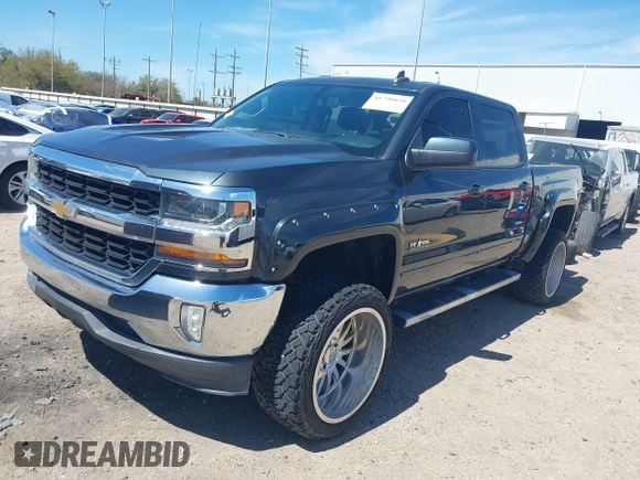 2018 Chevrolet Silverado 1500 LT with VIN 3GCPCREC1JG127396, listed as a IAAI auction lot 41790850 with 138,725 mi miles and . Bid and sale history available at DreamBid. Image 2.