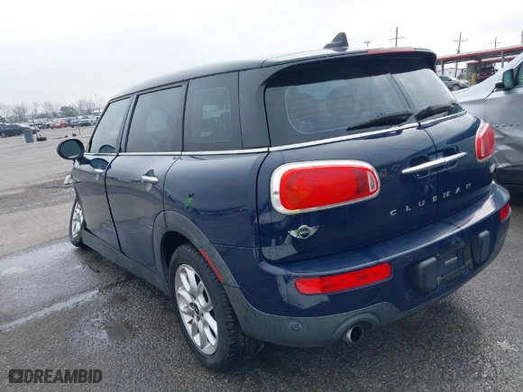 2016 MINI Cooper Clubman with VIN WMWLN5C54G2E30843, listed as a IAAI auction lot 41371368 with 1 mi miles. Bid and sale history available at carsss.com. Image 3.